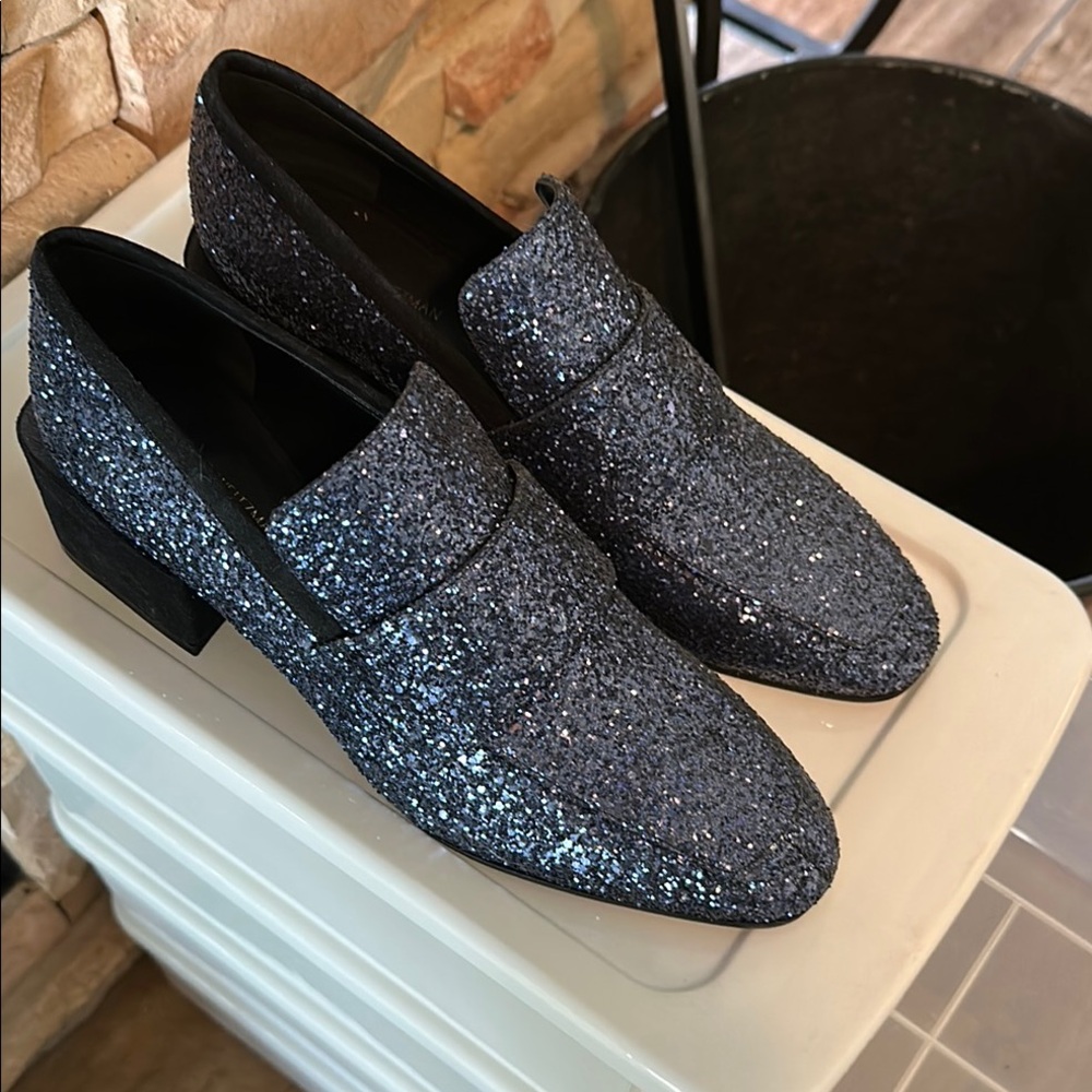 Woman’s blue glitter loafers